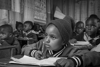 Children focus on their lessons inside the classroom.