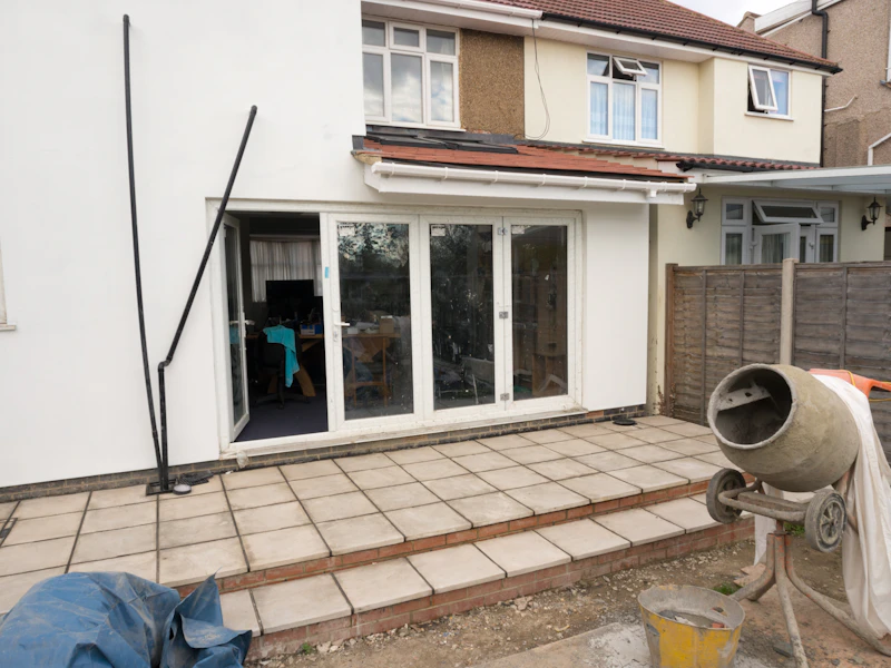 New patio doors being fitted on a house extension
