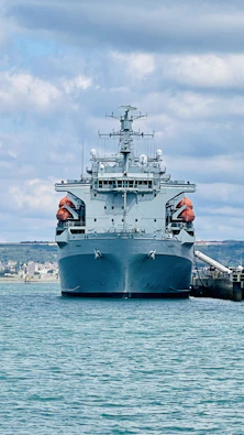 A large ship rests at the dock.