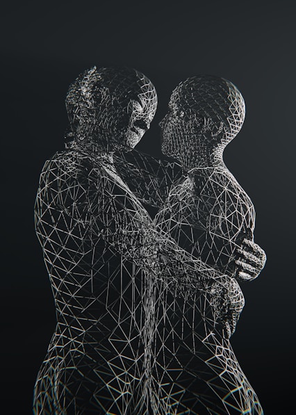 Two wireframe figures embrace affectionately against black.