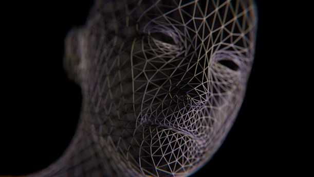 A wireframe head emerges from darkness