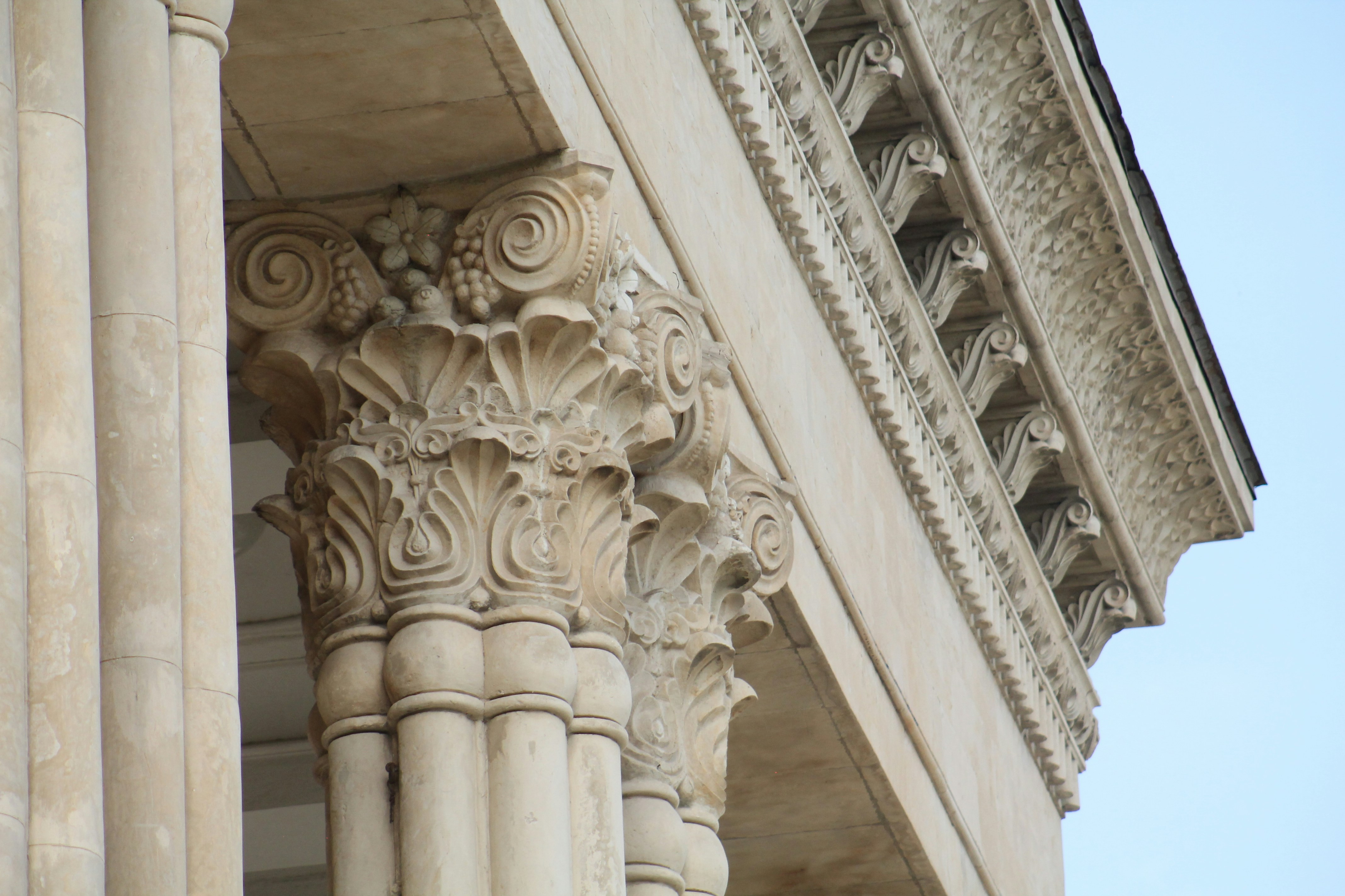 A close-up photograph of an ornate architectural detail, such as intricate wrought iron or carved woodwork on a historic Savannah home, symbolizing preservation and craftsmanship.