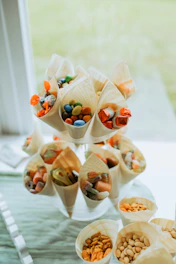 Candy cones are presented on a tiered display.