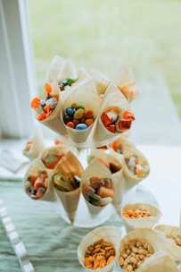 Candy cones are presented on a tiered display.