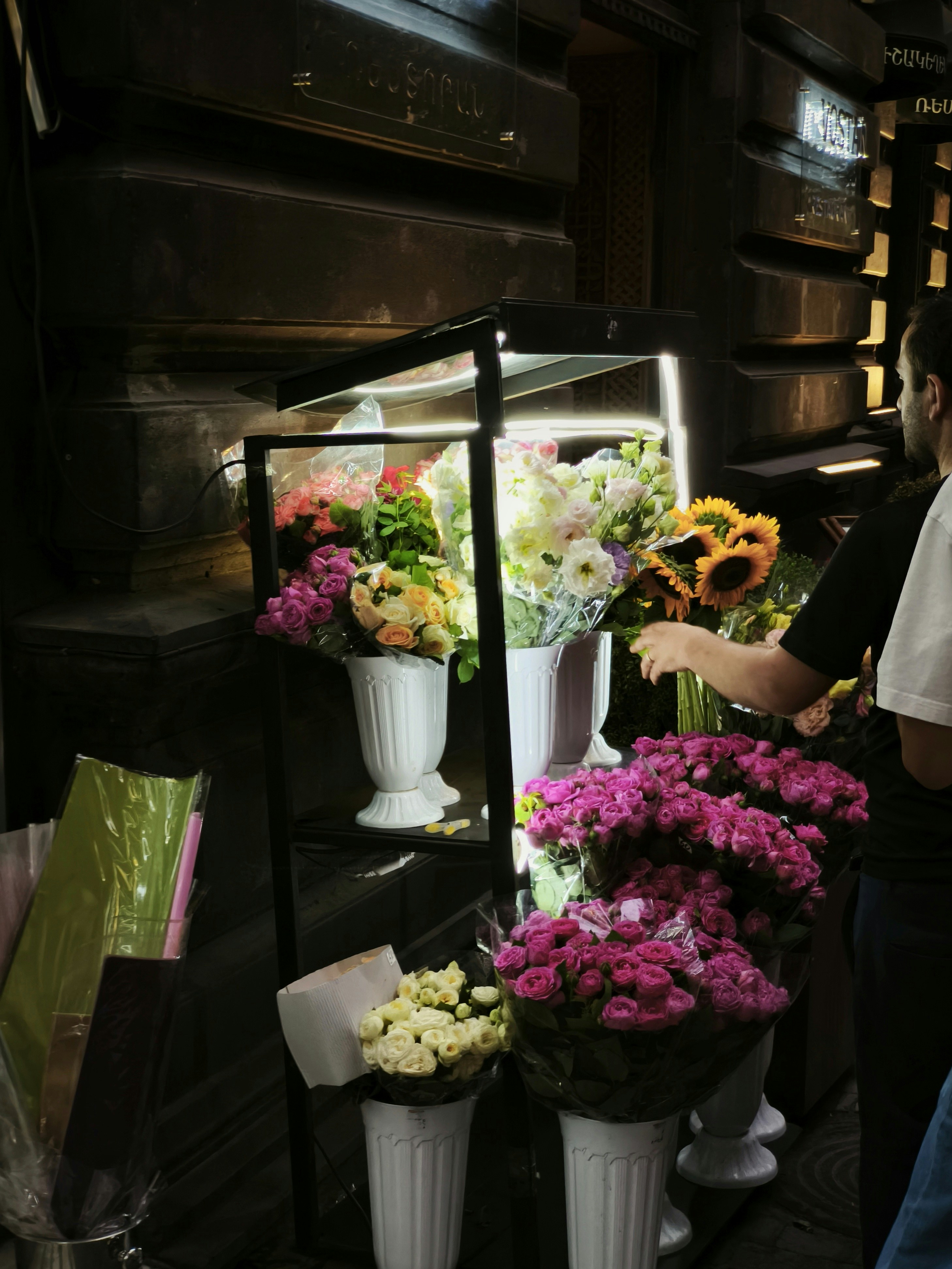 A flower shop with vibrant bouquets on display.