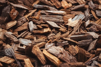 Wood chips fill the image with a brown hue.
