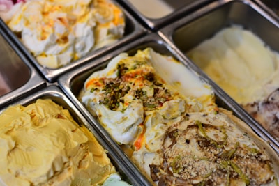 Delicious, colorful ice cream flavors are displayed.