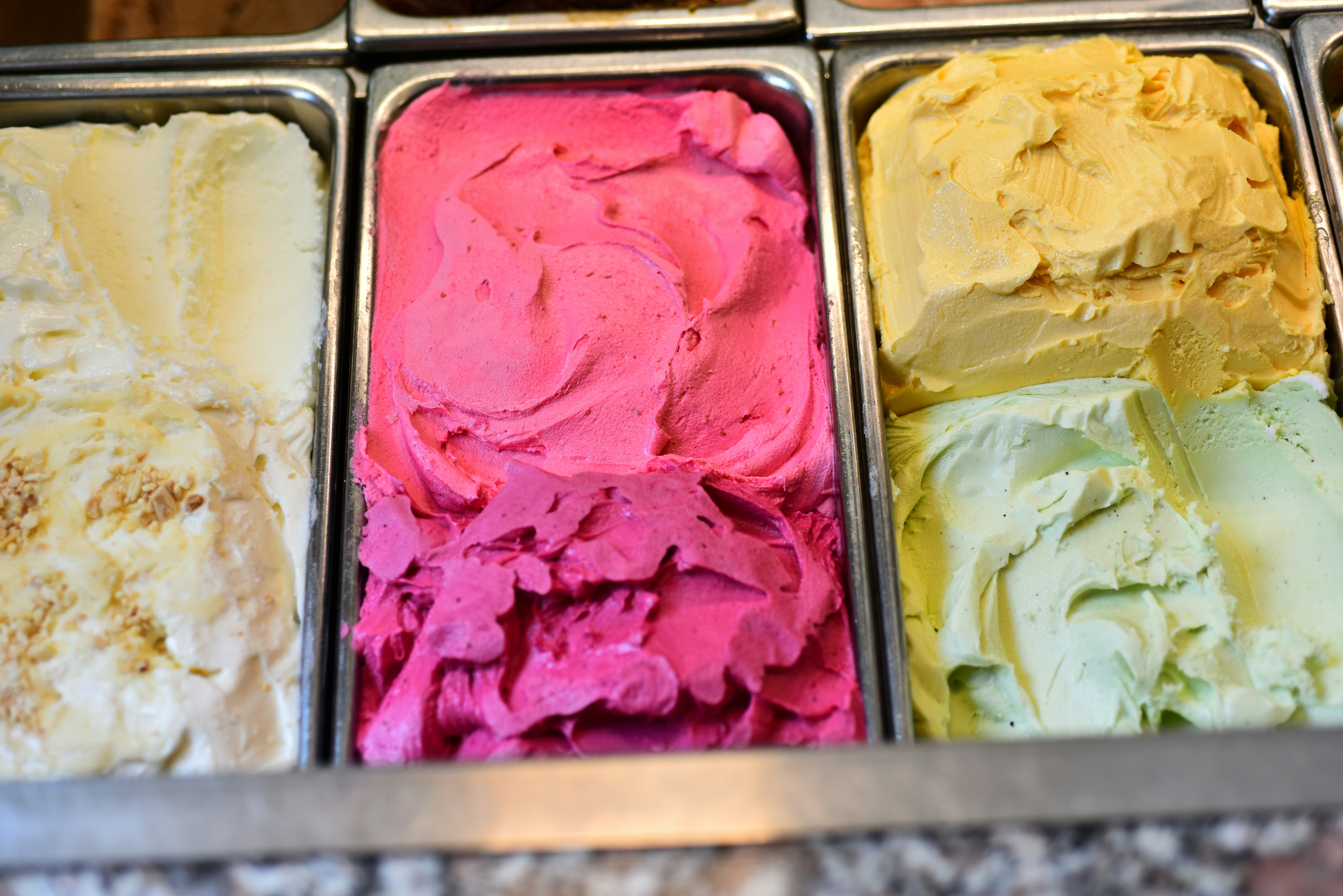 Different flavors of ice cream are displayed.