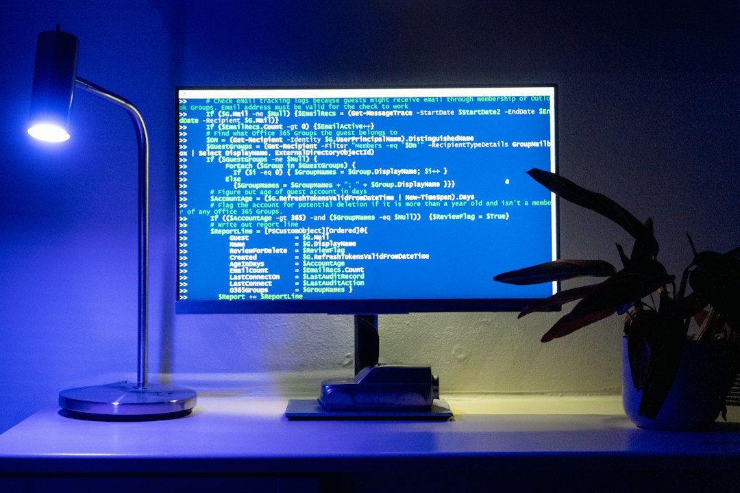 A computer screen displays lines of code.