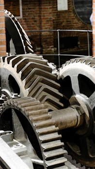 Gears interlocking, creating industrial motion.