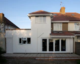 A modern home extension with large windows.