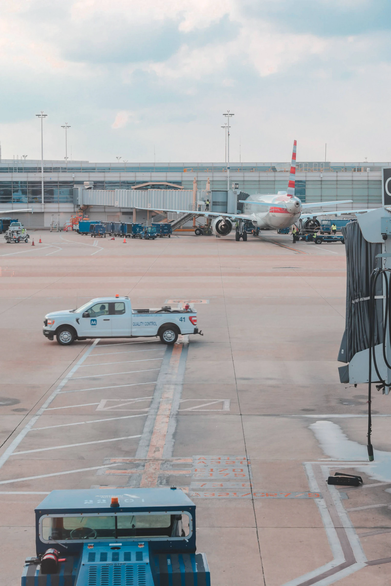 An airplane parked at the airport terminal