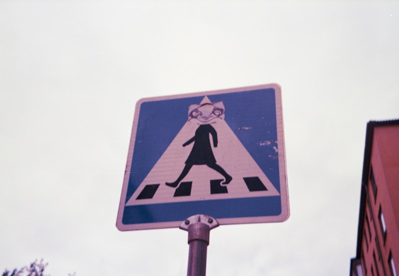 A pedestrian crossing sign is shown.