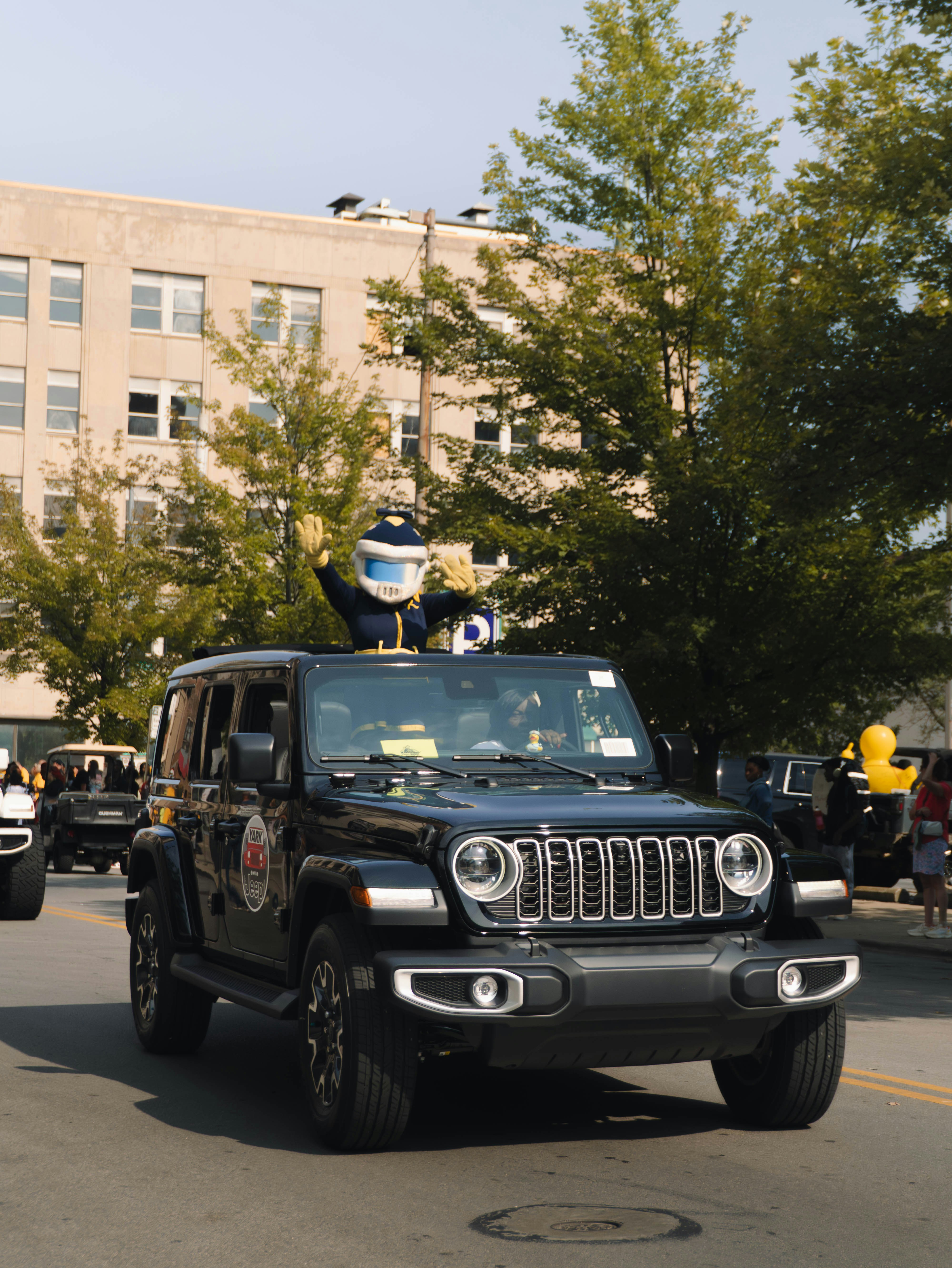 A vibrant Jeep Wrangler parade rolls through downtown Toledo during the 2025 Toledo Jeep® Fest, celebrating the City’s deep-rooted Jeep heritage.