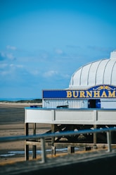 The burnham-on-sea pier stands by the sea.