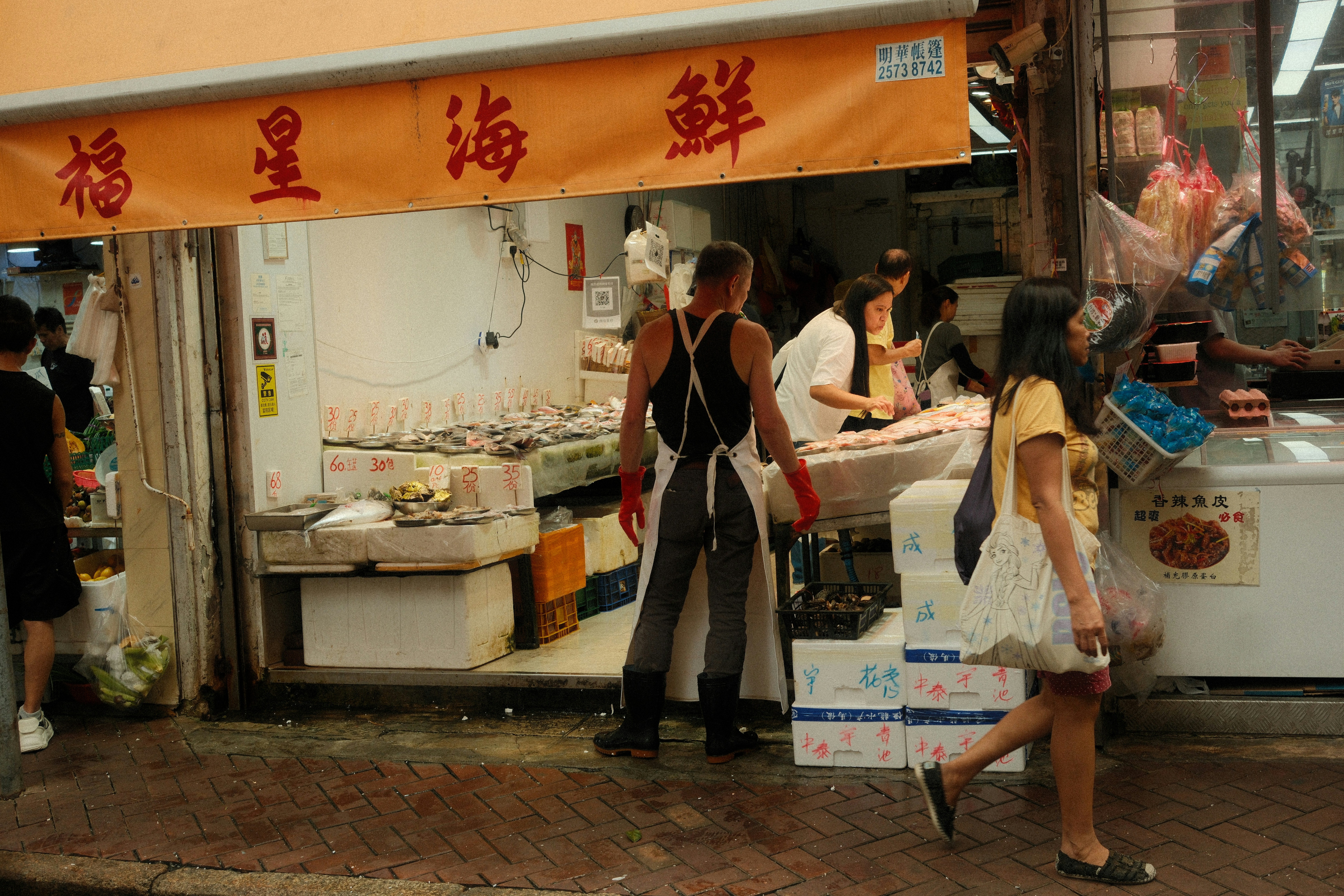 A man works in a fish market.