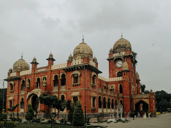 A beautiful, red-brick building with domes in Indore