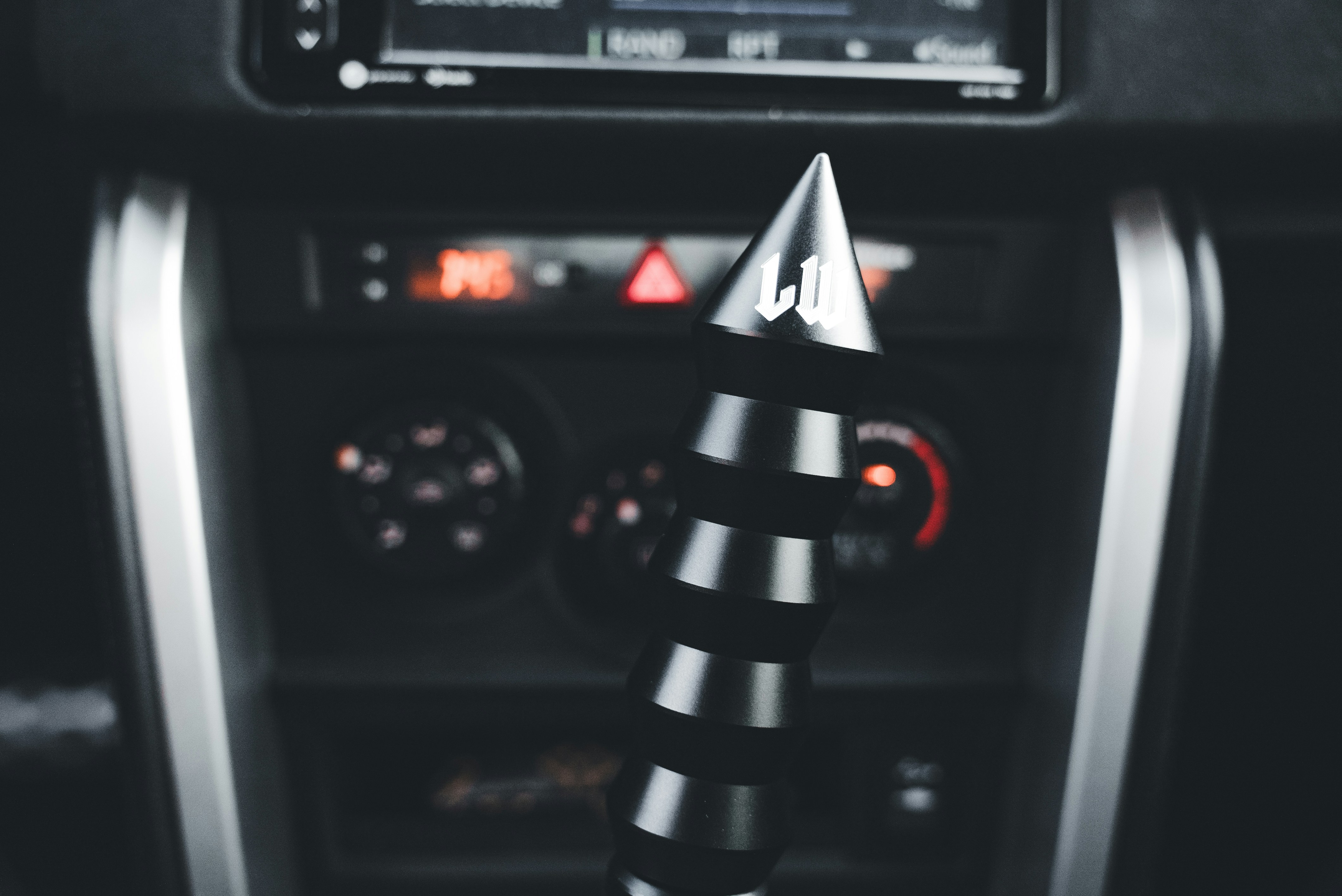 A custom gear shift is visible inside the car.