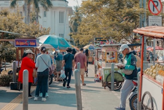 Street vendors and people are bustling.