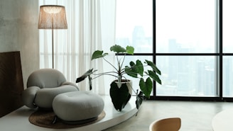 Cozy and minimalist living room with city view.