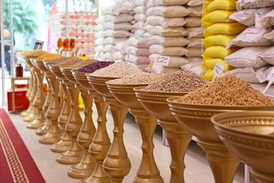 Various spices and grains are on display.