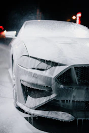 A car gets washed with foam.