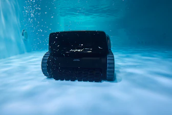 A pool robot cleaning the bottom underwater.