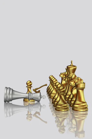 Gold chess pieces have defeated the silver king.