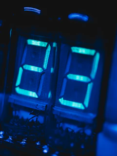 Glowing numbers displayed on a digital clock.