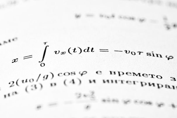 Mathematical formulas are written on a white page.