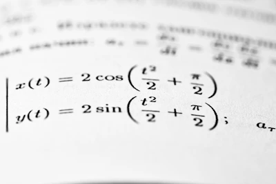 Mathematical equations with trigonometric functions are shown.