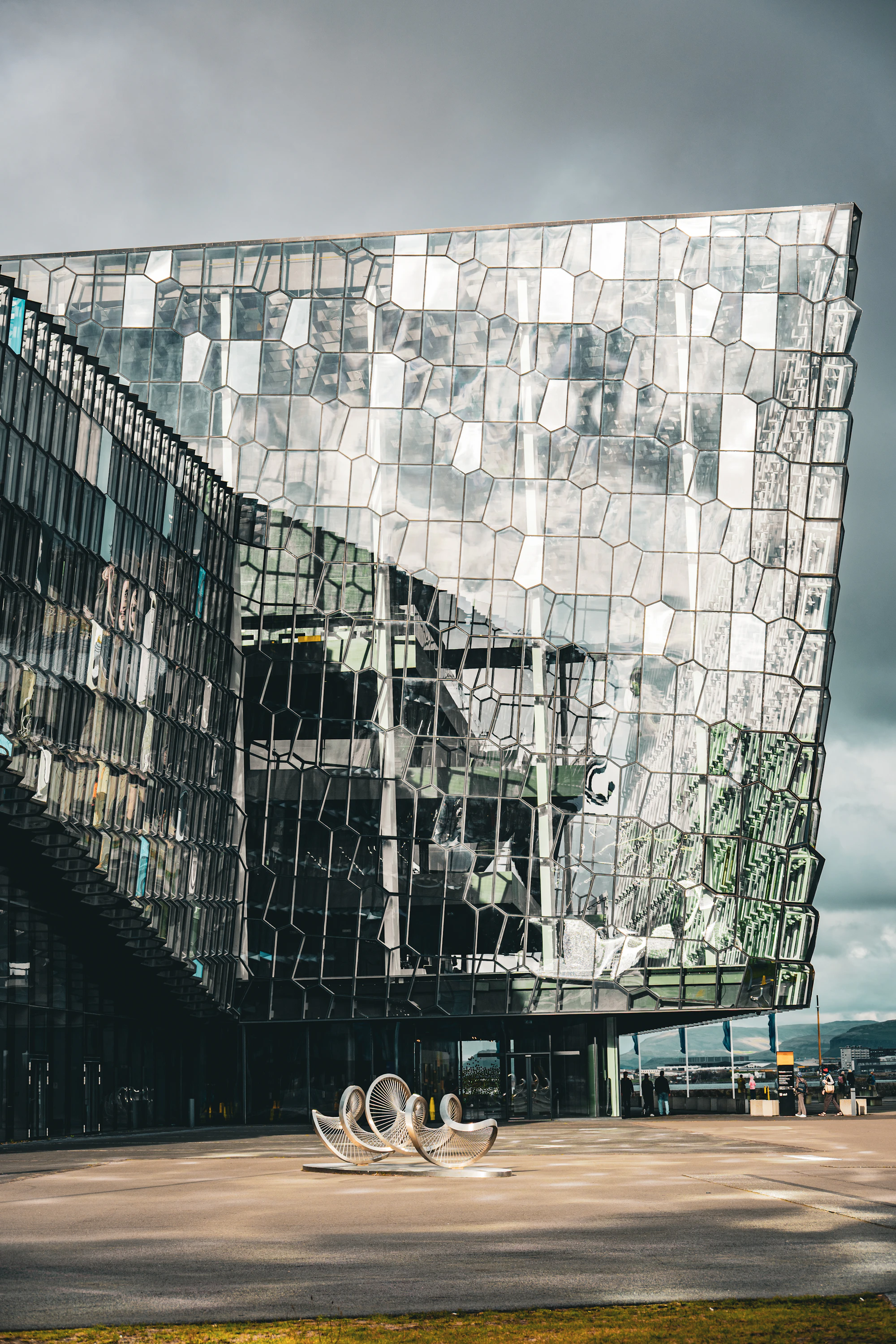 A building with a faceted glass facade