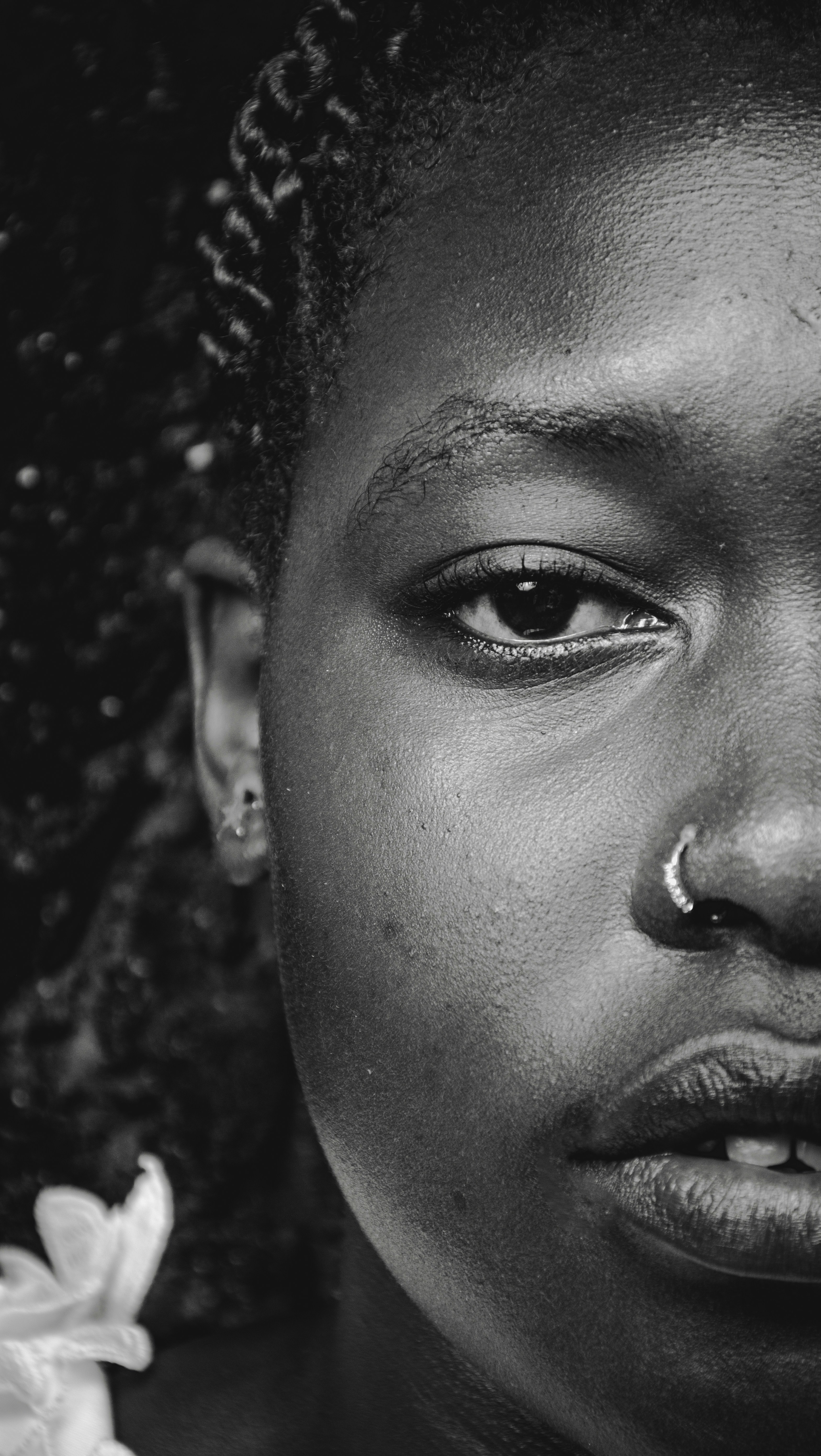 A striking black and white portrait of a woman.