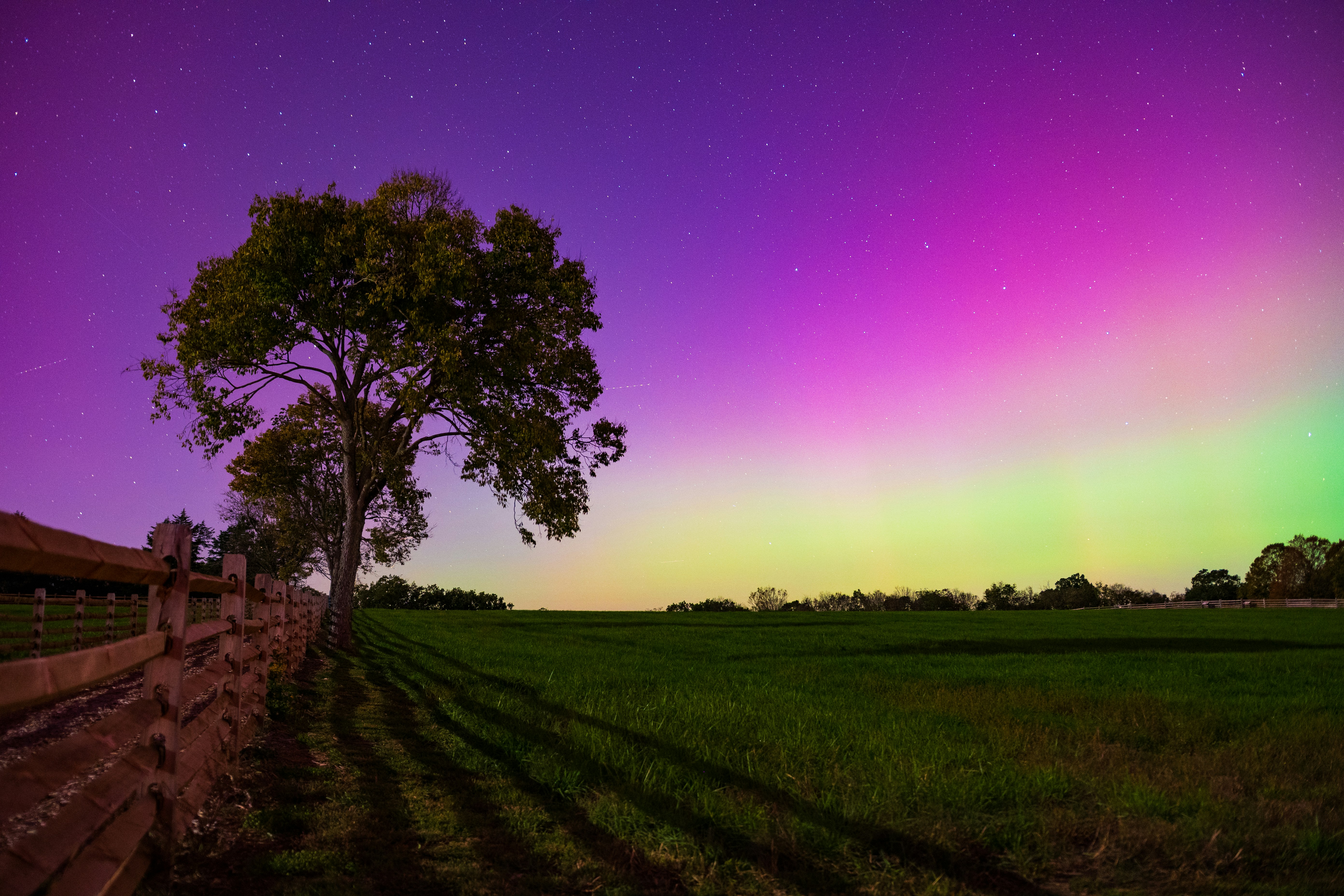 The aurora borealis lights up the night sky.