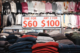 Sweaters are on sale with two for $100.