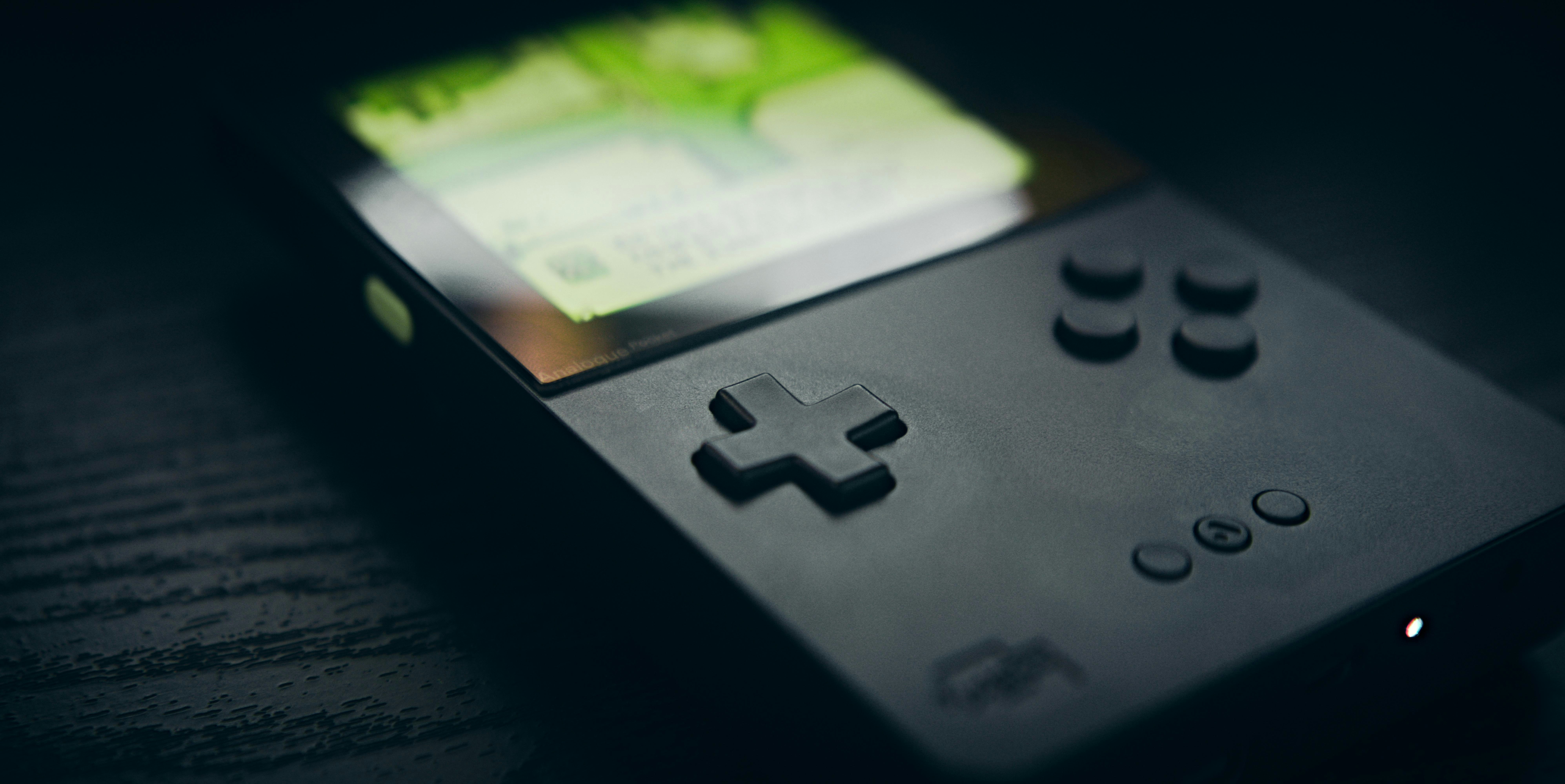 A game console with money displayed.