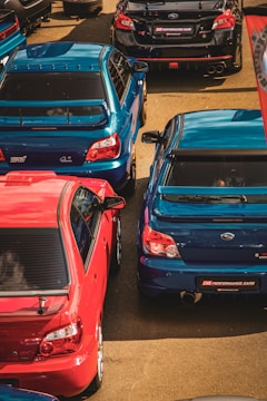 Subaru cars are parked, viewed from above.