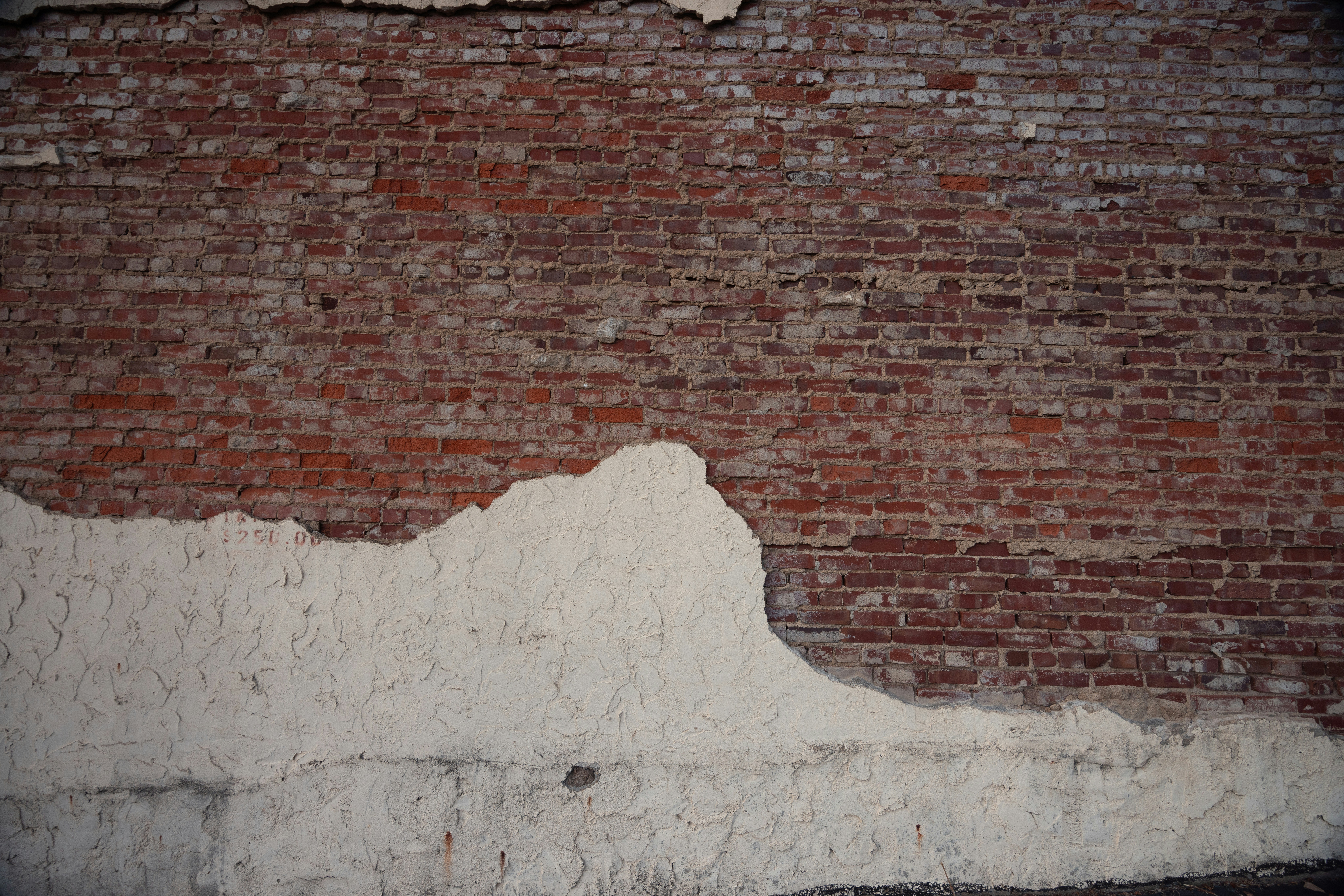 A bowing basement wall with a horizontal crack - Basement waterproofing Baltimore County