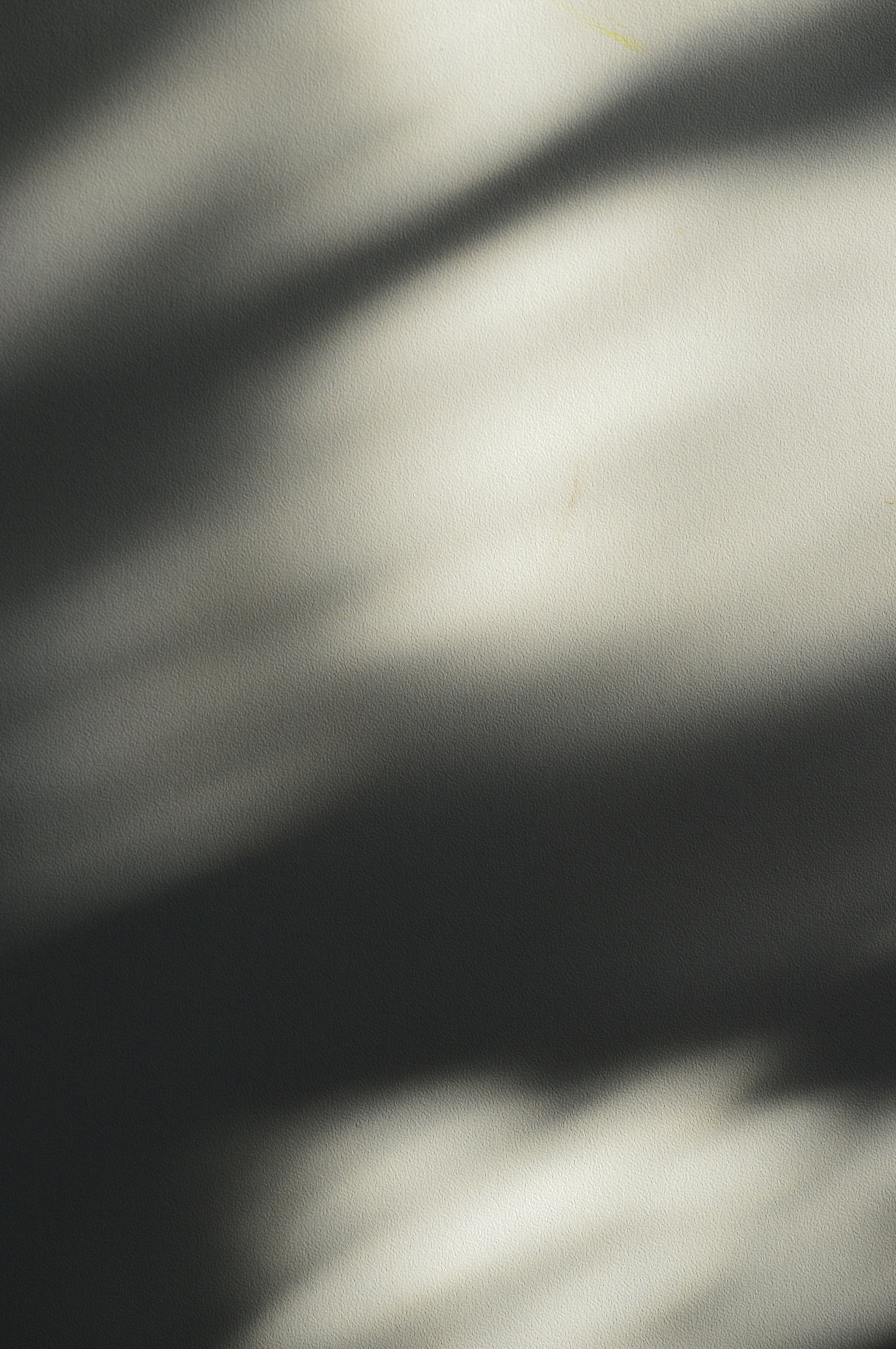 Shadows and light create a moody abstract composition.