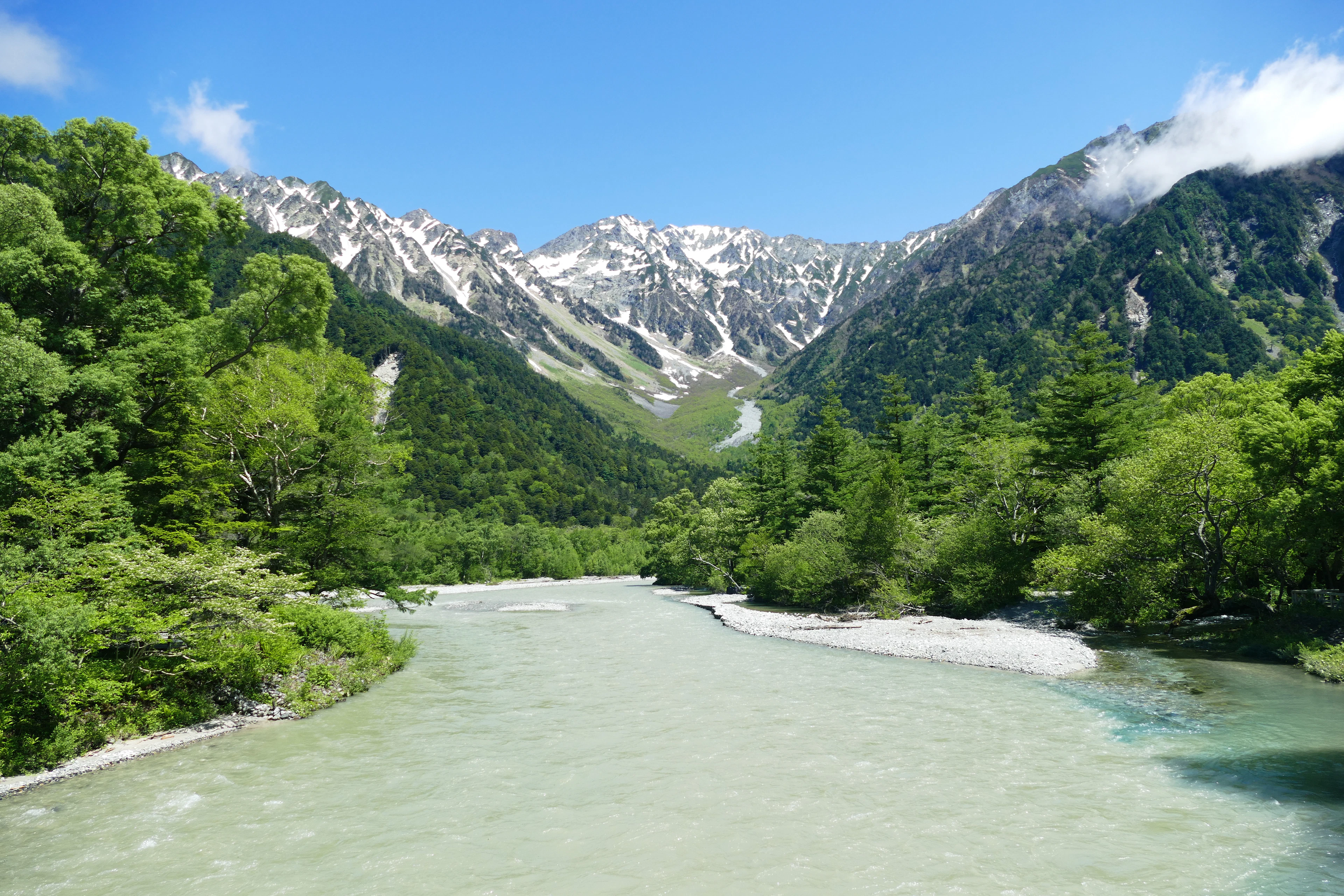 A clear river running through the Kamikochi valley in the Japanese Alps