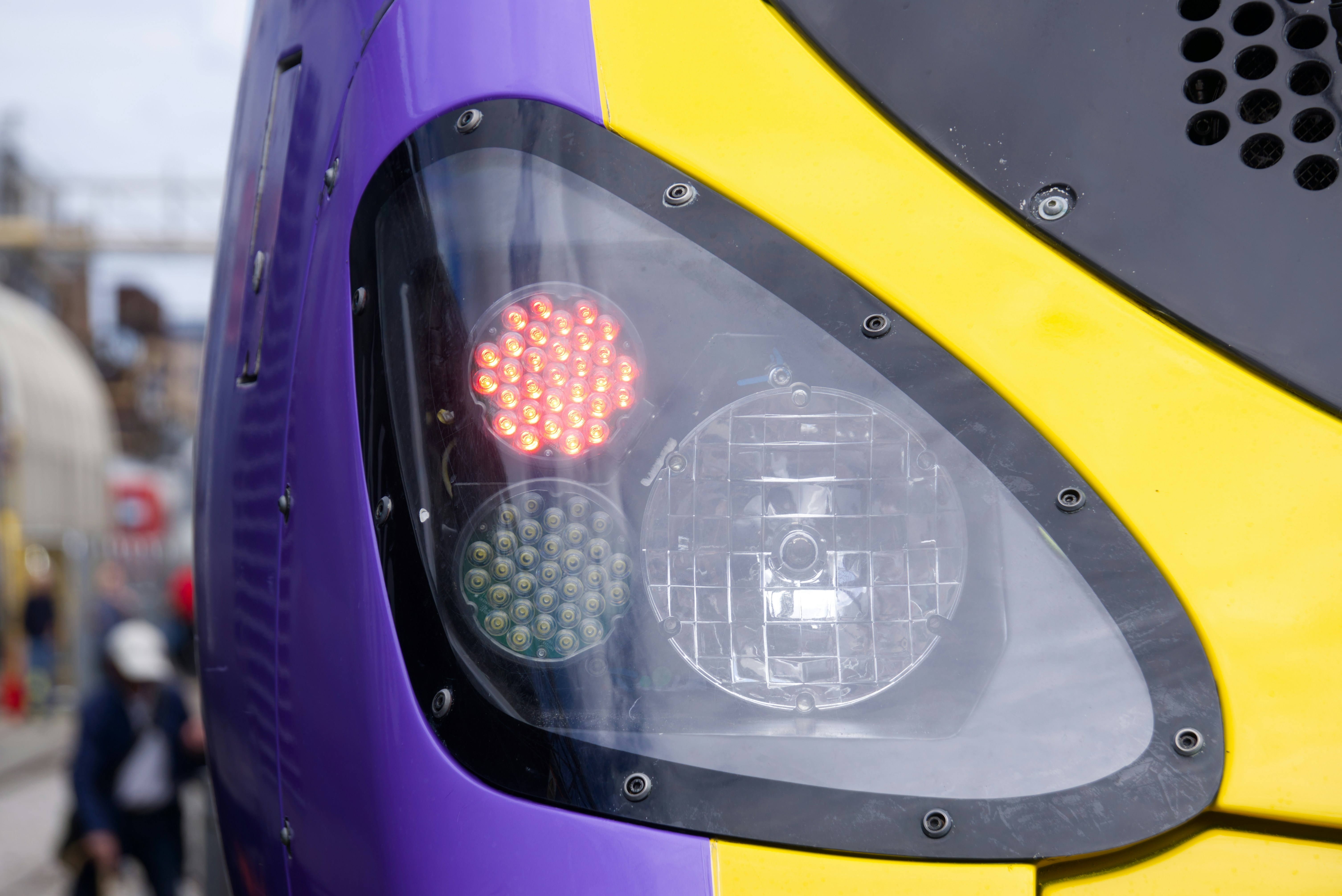 Train headlight with colored lights.