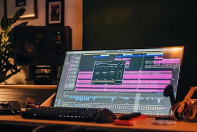 A music production studio is shown with a computer.