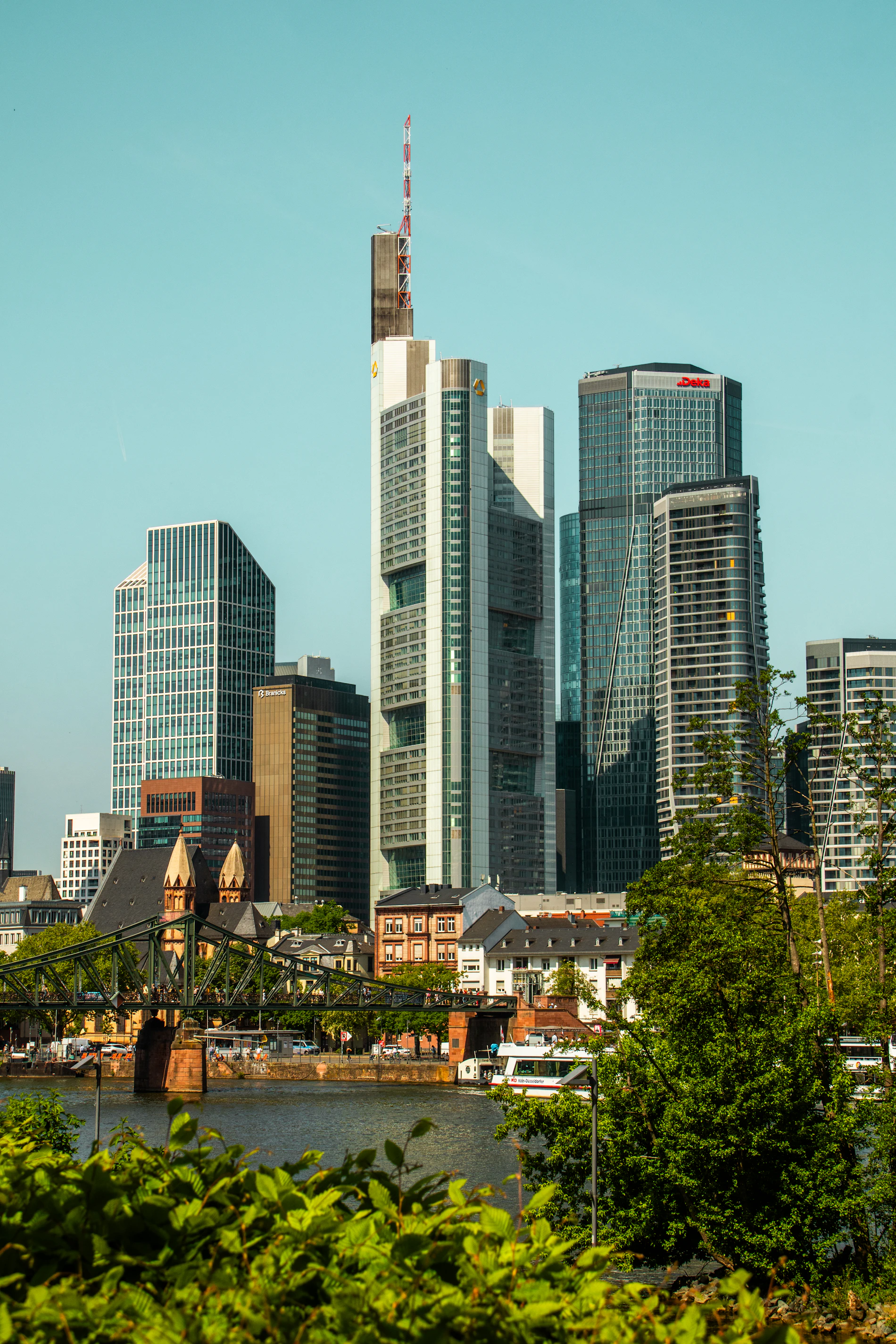 Skyscrapers of the Frankfurt financial district at dusk, seen across the River Main