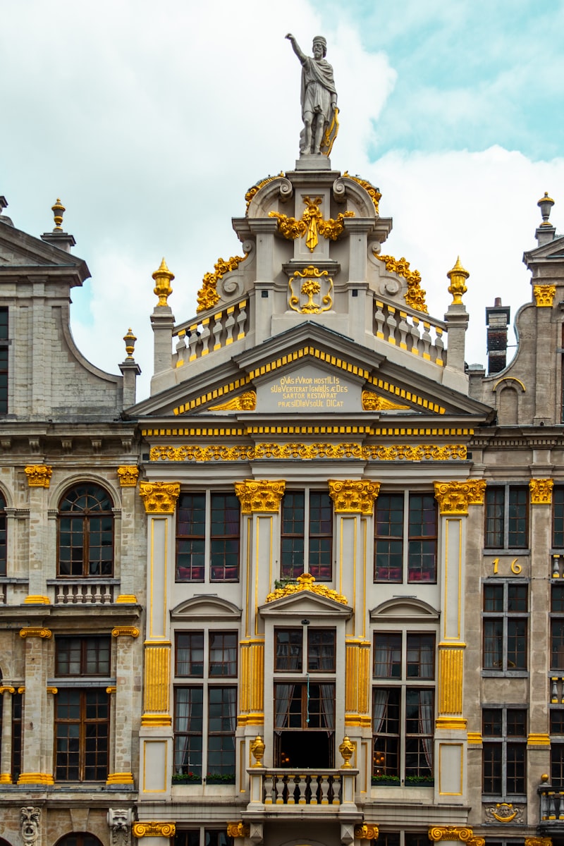 Ornate Art Nouveau building facade with golden accents and sculpted details