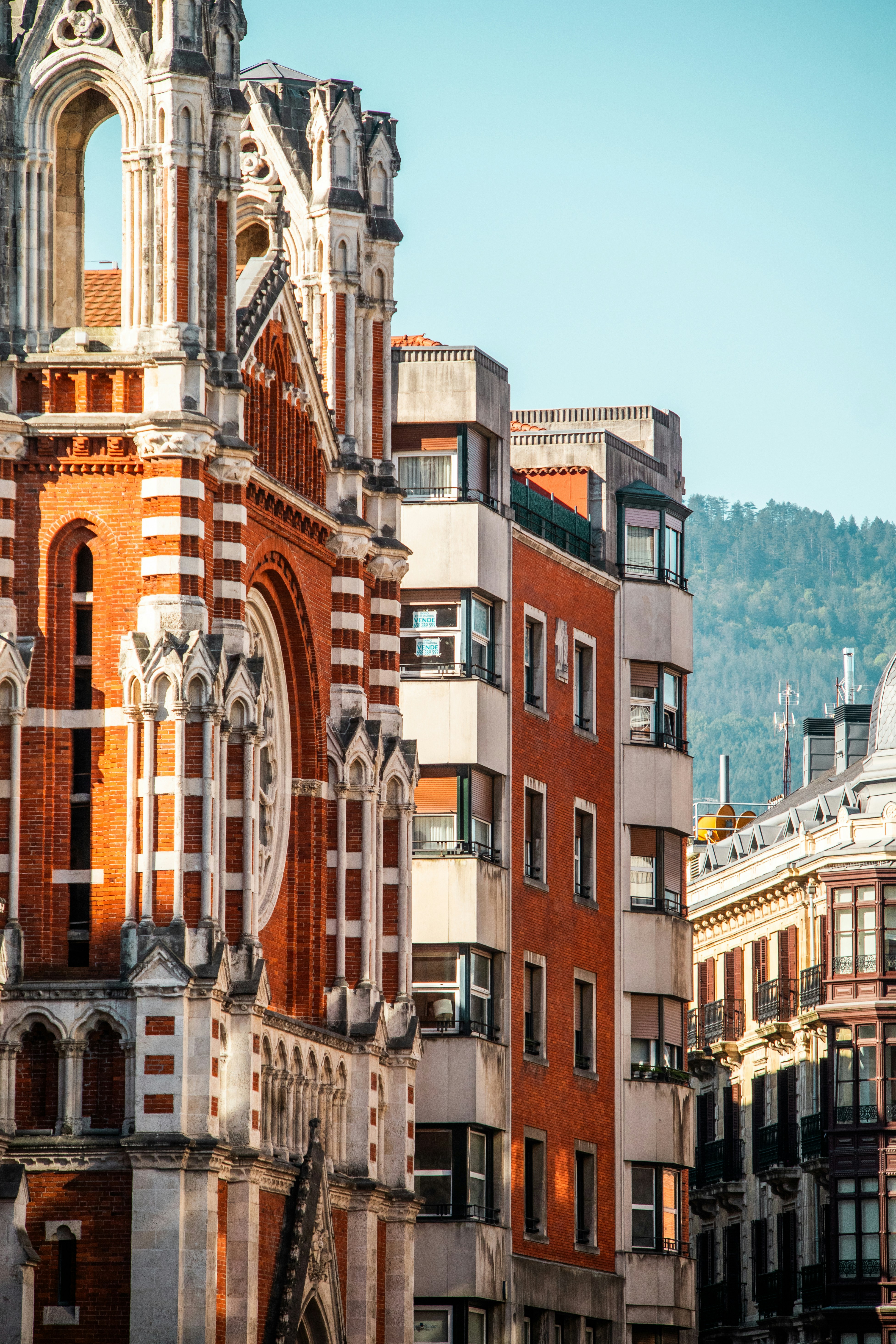 Buildings with interesting architecture in the sunlight.