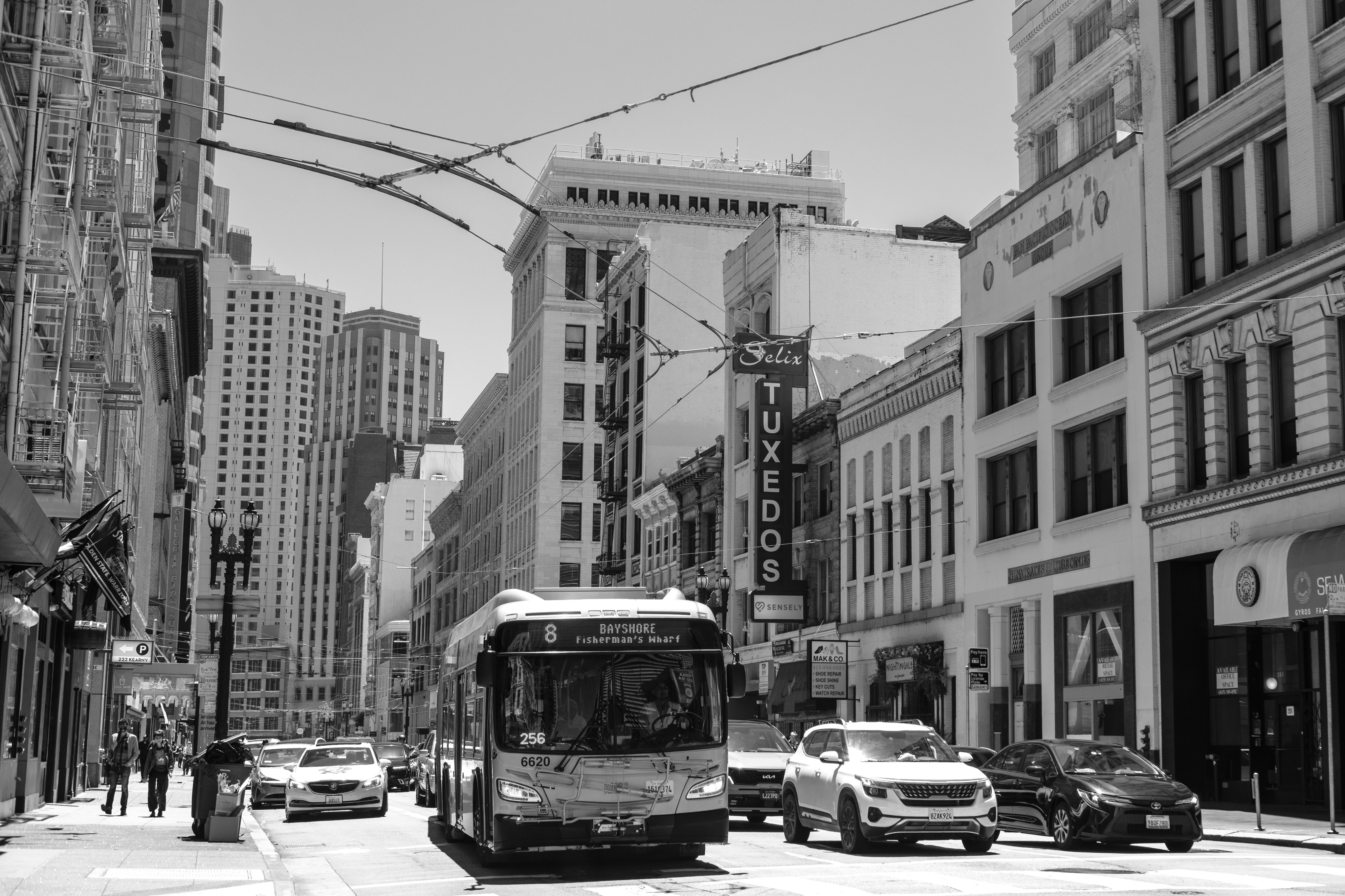A street scene in a city with buildings.