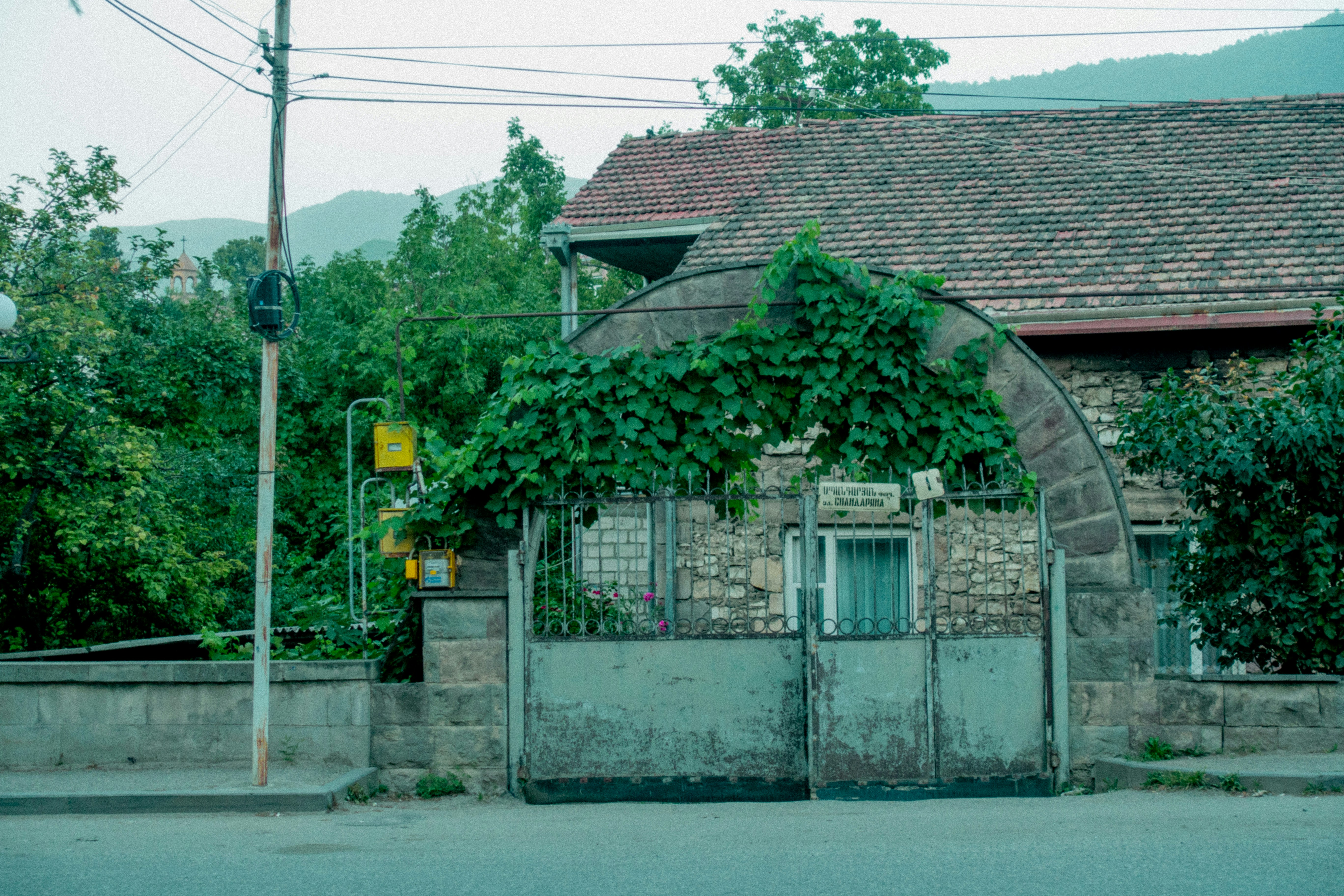 An old house with a stone facade.