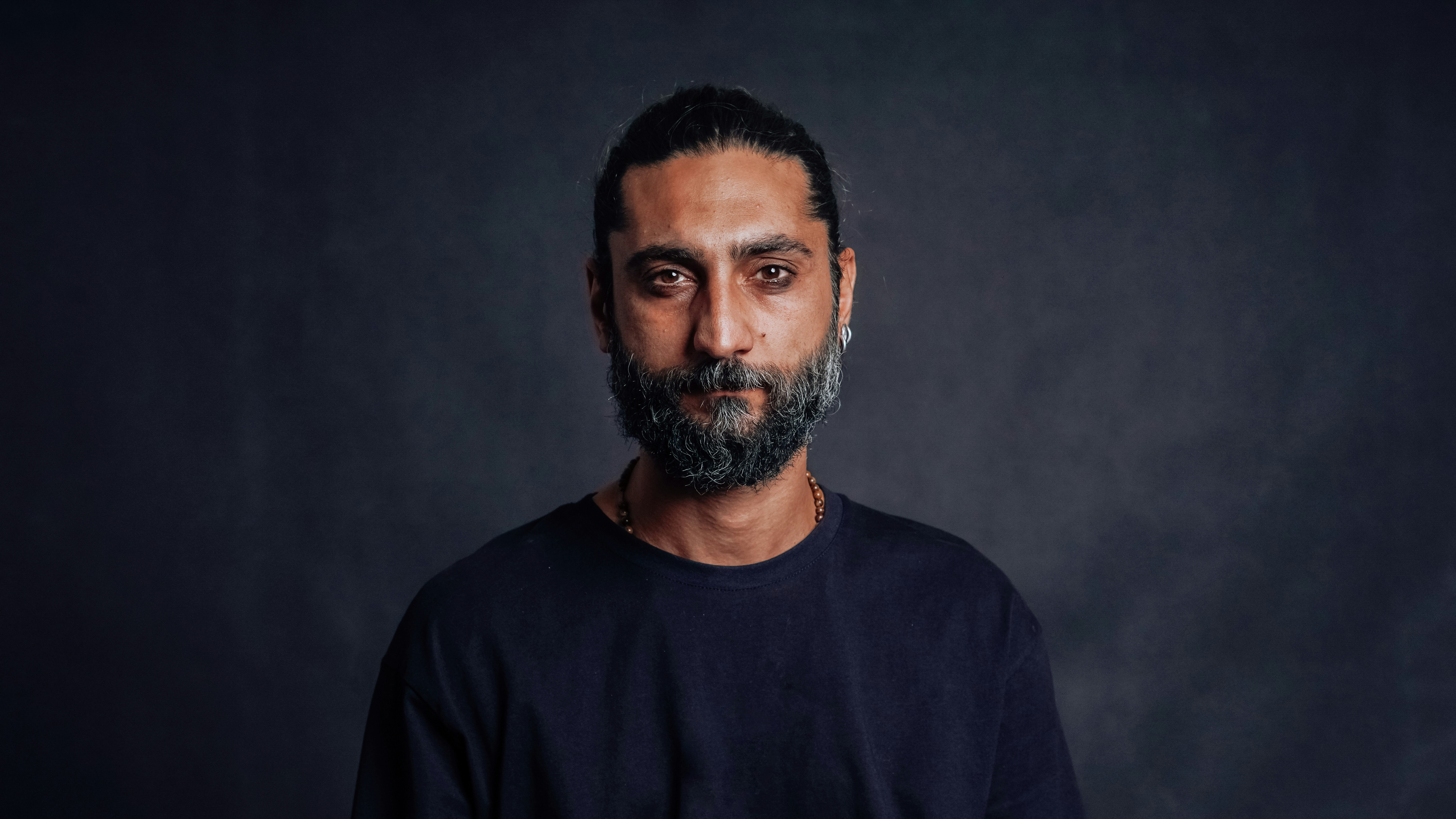 Bearded man wearing casual t-shirt