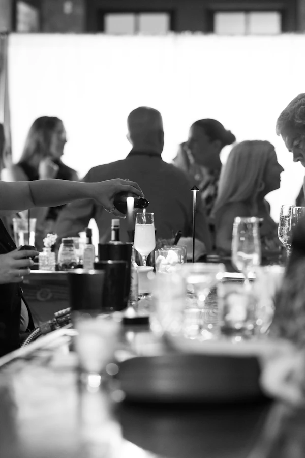 People gathered around the Yourmeal table