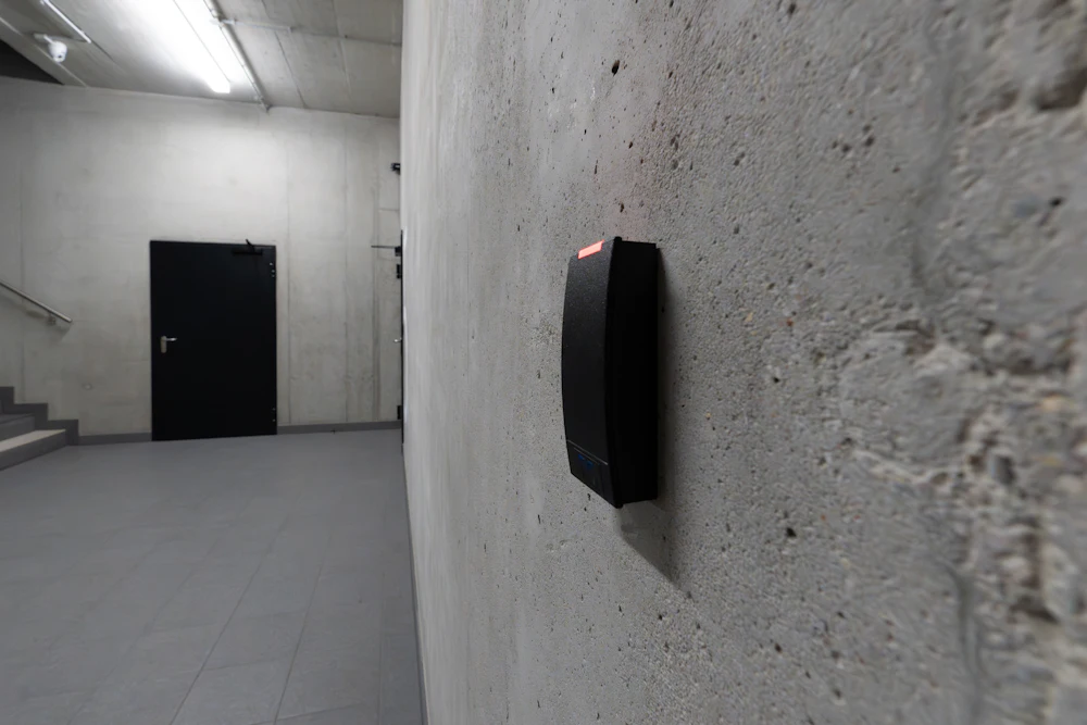Access control reader beside a secure door